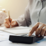 person calculating the deductions standard deduction 2025